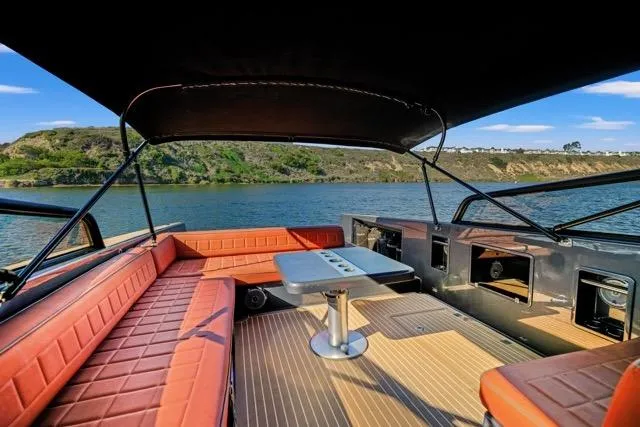Slide: The Image of Luxurious 2015 VanDutch 40 yacht interior with elegant seating and scenic water view. - 35