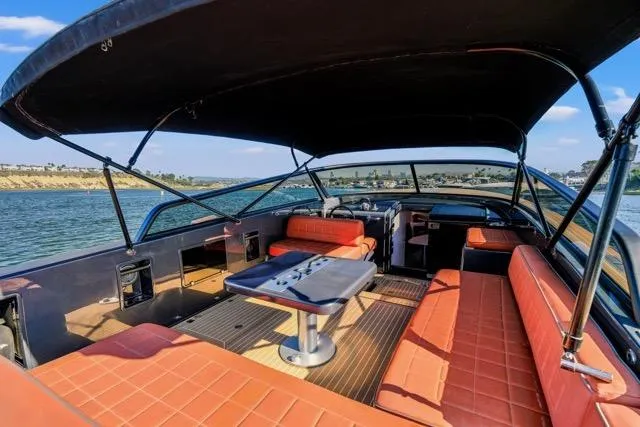 Slide: The Image of Luxurious 2015 VanDutch 40 yacht interior with orange seating and sleek design. - 37