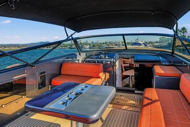 Slide: The Image of Luxurious 2015 VanDutch 40 yacht interior with orange seating and sleek design. - 39