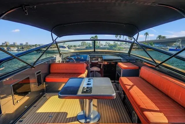 Slide: The Image of Luxurious 2015 VanDutch 40 yacht interior with orange seating and sleek design. - 40
