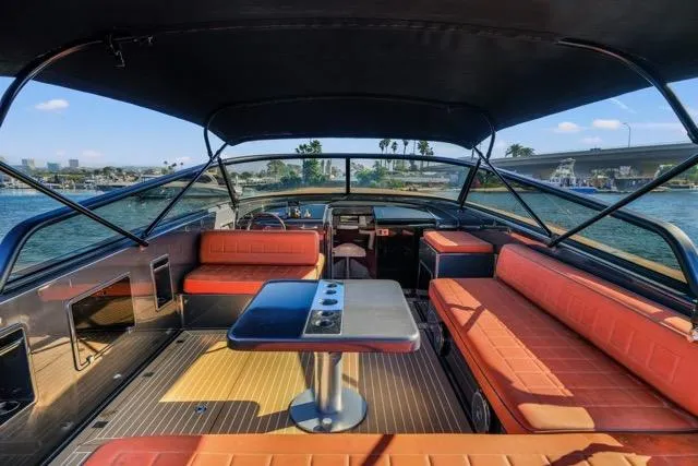 Slide: The Image of Luxurious 2015 VanDutch 40 yacht interior with orange seating and sleek design. - 41