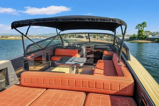 Slide: The Image of Luxurious 2015 VanDutch 40 yacht with spacious seating and canopy on a sunny day. - 43