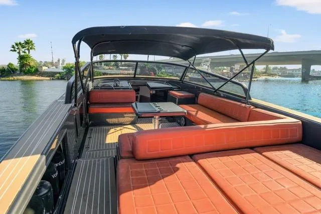 Slide: The Image of 2015 VanDutch 40 yacht with spacious seating and canopy on a sunny day. - 44