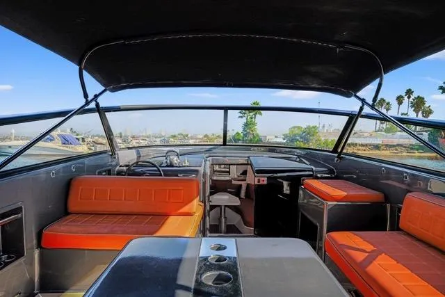 Slide: The Image of 2015 VanDutch 40 yacht interior with orange seating and sleek design. - 48