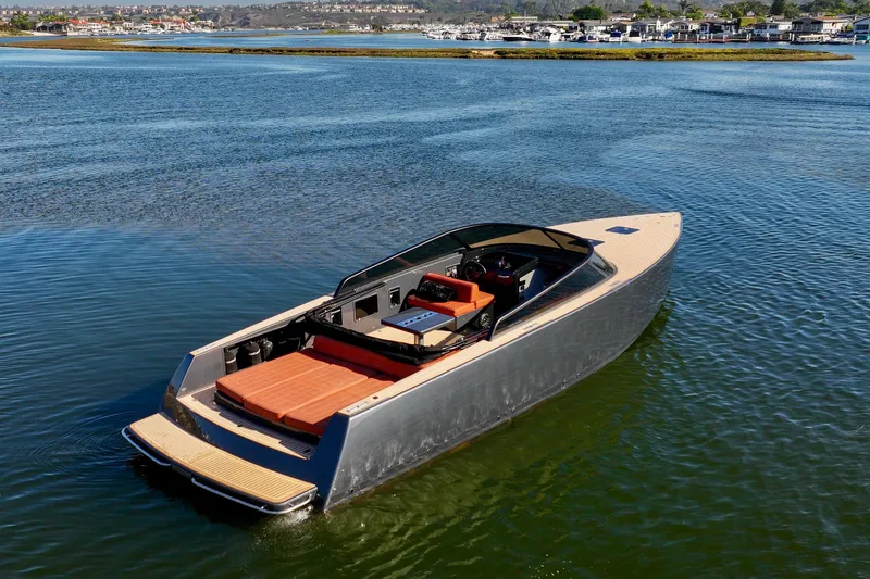 Slide: The Image of 2015 VanDutch 40 luxury yacht on calm water, showcasing sleek design and modern features. - 5