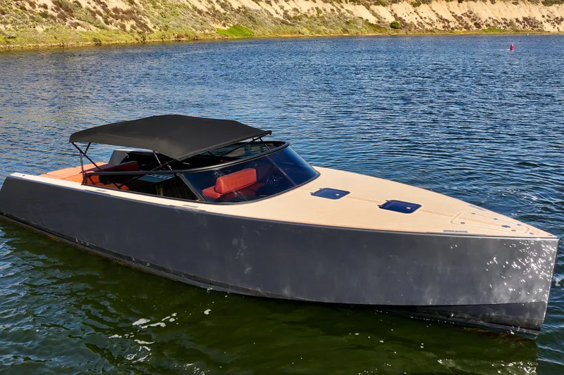 Slide: The Image of 2015 VanDutch 40 yacht with sleek design, cruising on calm waters. - 6