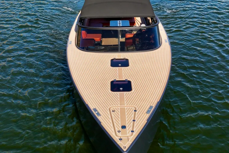 Slide: The Image of 2015 VanDutch 40 yacht with sleek design on open water. - 9