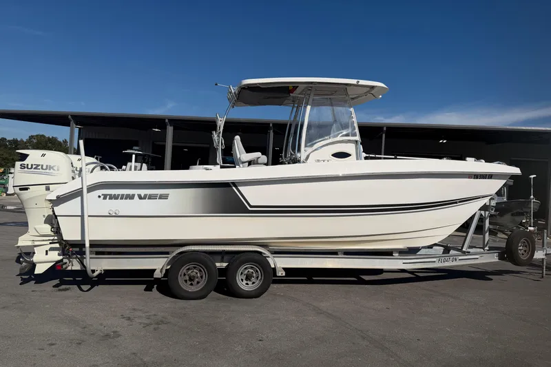 Slide: The Image of 2018 Twin Vee 260 CC SE boat hull underside with metal fittings. - 13