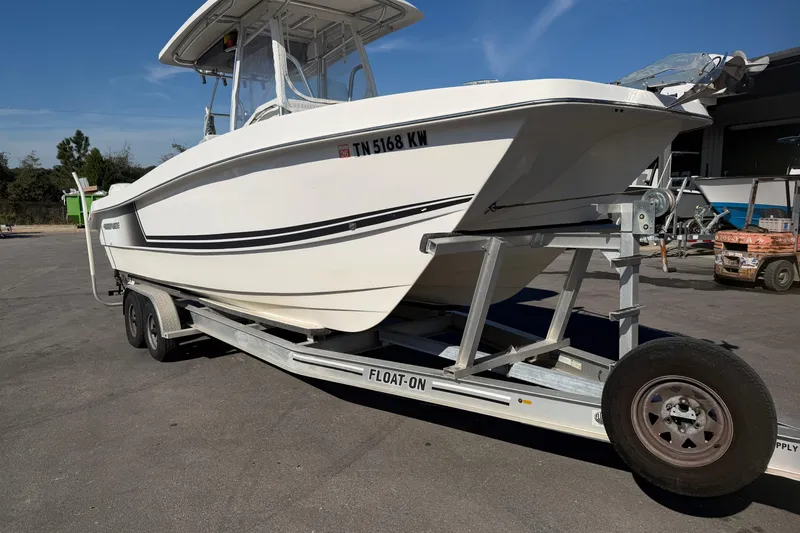 Slide: The Image of 2018 Twin Vee 260 CC SE catamaran hull on trailer, underside view. - 14