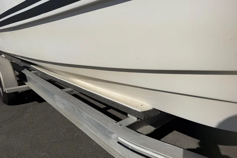 Slide: The Image of 2018 Twin Vee 260 CC SE boat on trailer, side view. - 19