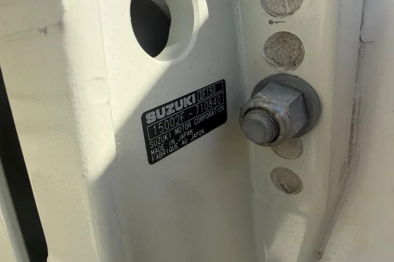 Slide: The Image of Close-up of Suzuki motor label on 2018 Twin Vee 260 CC SE boat. - 26