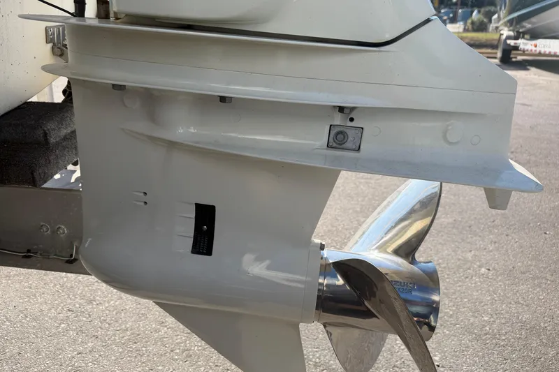 Slide: The Image of Close-up of a 2018 Twin Vee 260 CC SE boat's outboard motor propeller. - 30