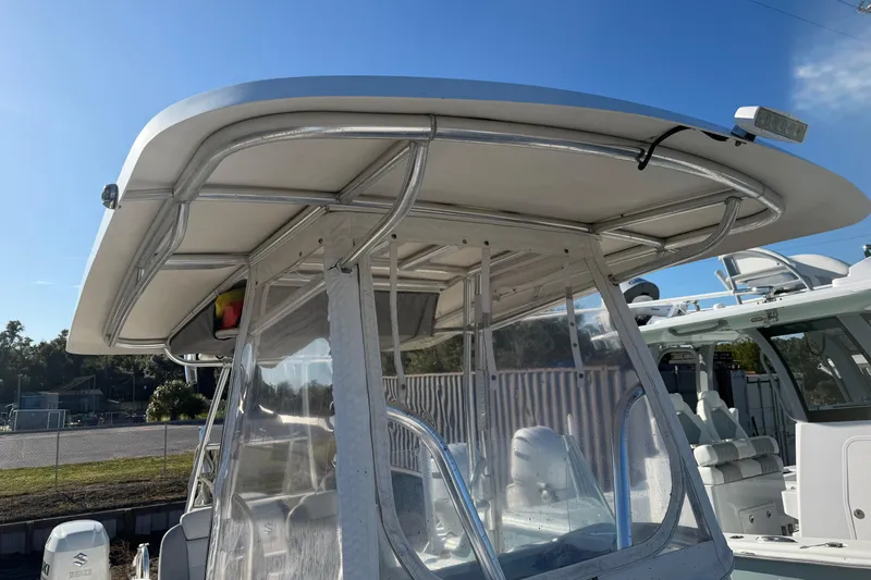 Slide: The Image of 2018 Twin Vee 260 CC SE boat deck with stainless steel railings. - 7