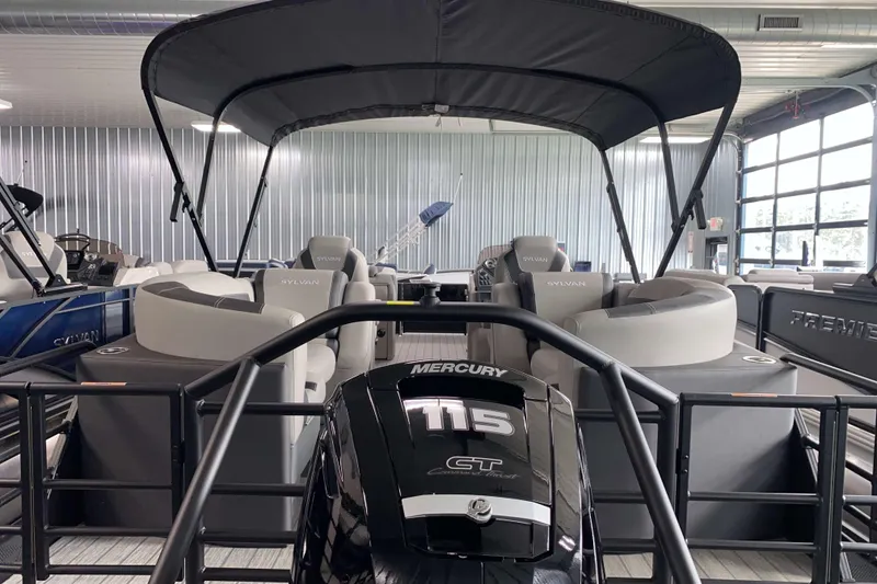 Slide: The Image of 2025 Sylvan L3 LZ pontoon boat with Mercury 115 engine in showroom. - 17