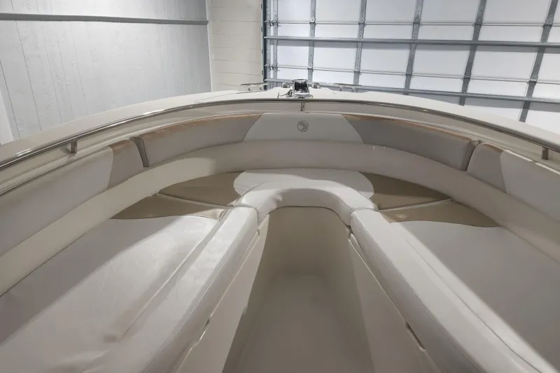 Slide: The Image of Bow of 2012 Edgewater 228CC boat with stainless steel fittings and cleats. - 19