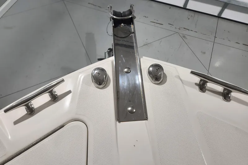 Slide: The Image of Anchor storage compartment on a 2012 Edgewater 228CC boat. - 20