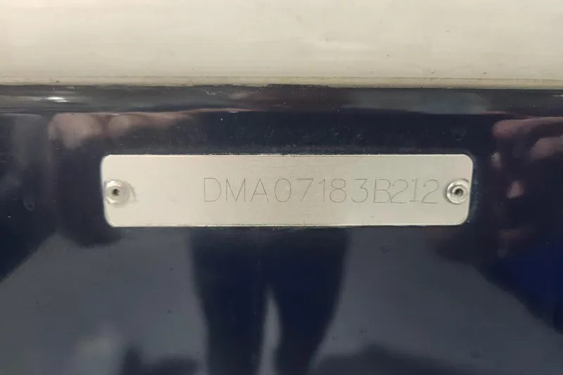 Slide: The Image of Yamaha 250 V6 outboard engine on 2012 Edgewater 228CC boat in showroom. - 28