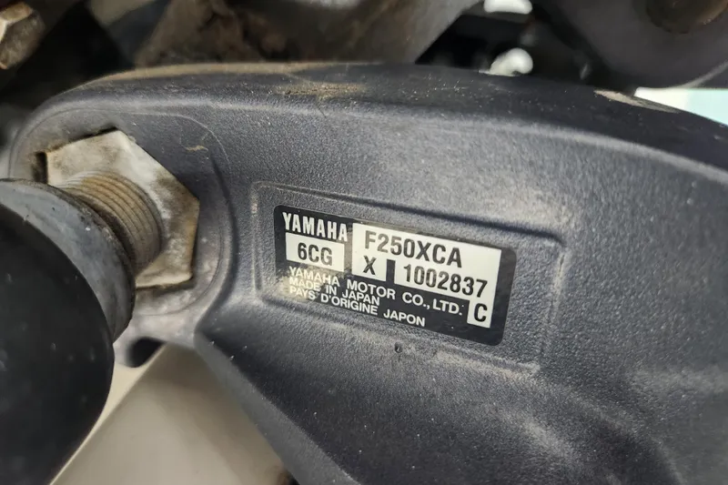 Slide: The Image of Close-up of Yamaha engine part on 2012 Edgewater 228CC boat. - 30