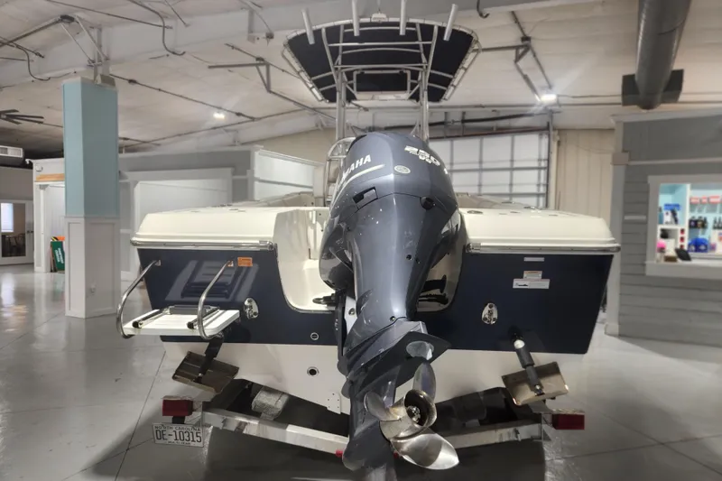 Slide: The Image of 2012 Edgewater 228CC boat console with Garmin and Fusion electronics. - 7