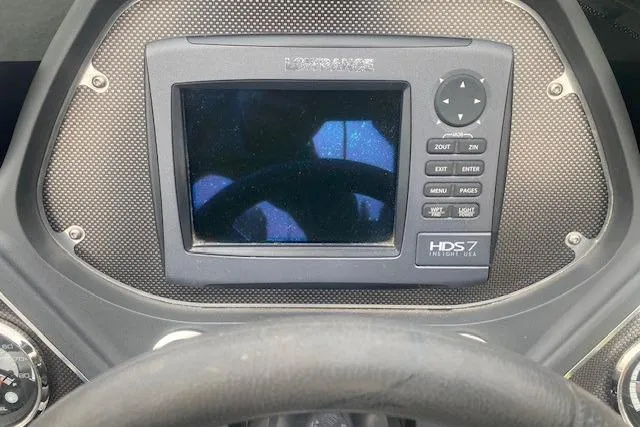 Slide: The Image of Dashboard of 2013 Ranger Z118 with Lowrance HDS-7 fishfinder display. - 4