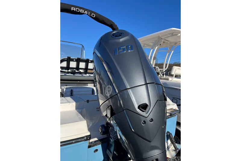 Slide: The Image of 2026 Robalo R180 Center Console with powerful 150 HP outboard engine. - 12