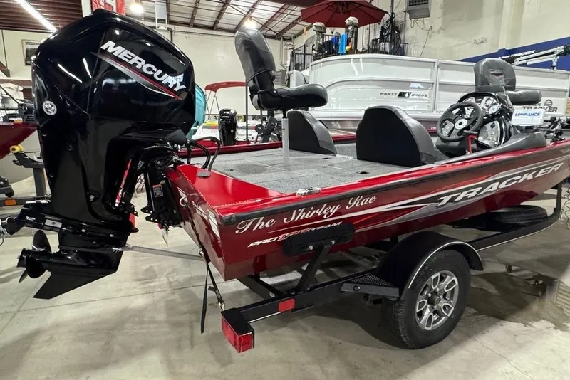 The Image of 2021 Tracker Pro Team 175 TXW boat with Mercury engine in showroom. - 1