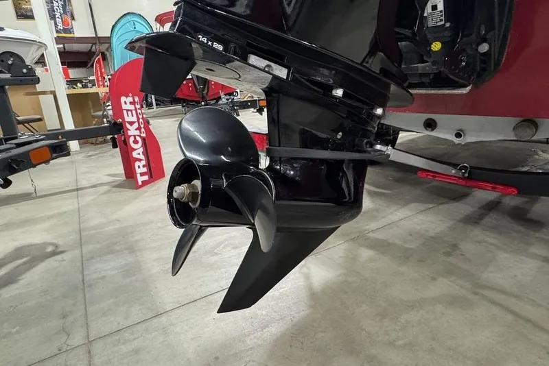 Slide: The Image of 2021 Tracker Pro Team 175 TXW boat propeller in showroom setting. - 14