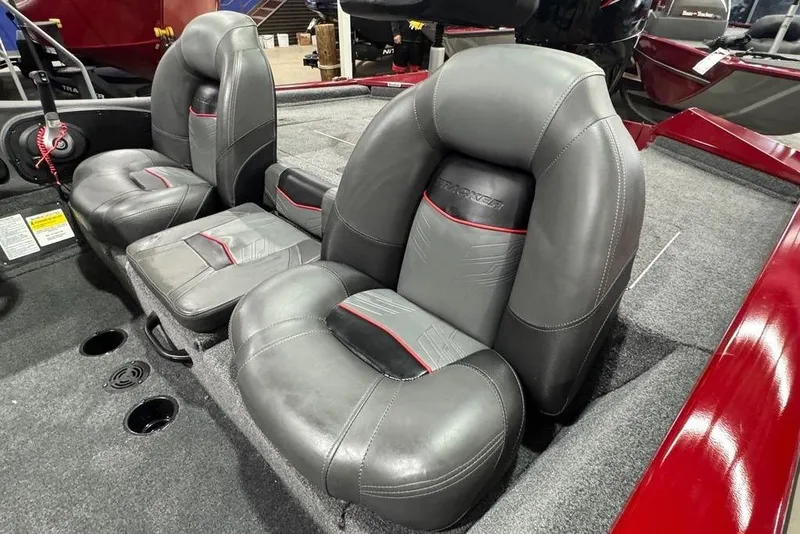 Slide: The Image of 2021 Tracker Pro Team 175 TXW boat seats, gray with red accents, interior view. - 25
