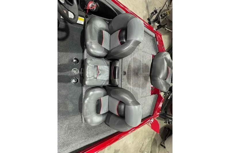 Slide: The Image of 2021 Tracker Pro Team 175 TXW boat interior with gray seating and red accents. - 43