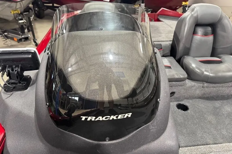 Slide: The Image of 2021 Tracker Pro Team 175 TXW boat interior with windshield and seating. - 45