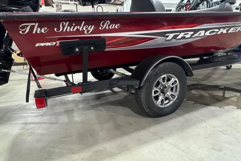 Slide: The Image of 2021 Tracker Pro Team 175 TXW boat, red with custom "The Shirley Rae" lettering. - 9