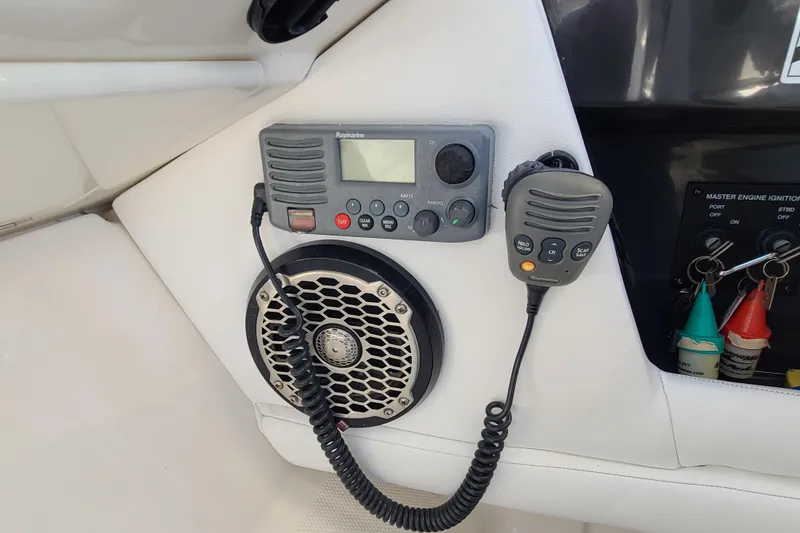 Slide: The Image of Control panel of a 2014 Sea Ray 350 SLX with radio and speaker system. - 11