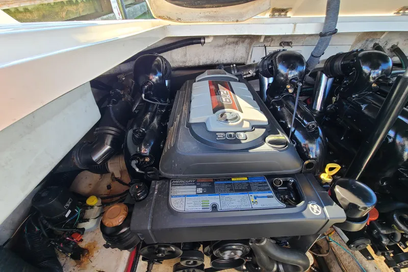 Slide: The Image of Engine compartment of a 2014 Sea Ray 350 SLX boat with Mercury 300 engine. - 23