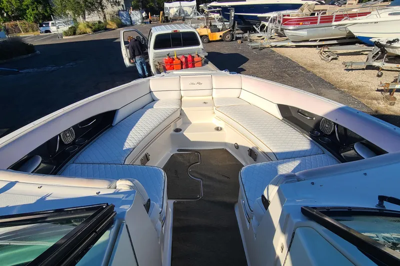 Slide: The Image of 2014 Sea Ray 350 SLX boat interior with spacious seating and modern design. - 3