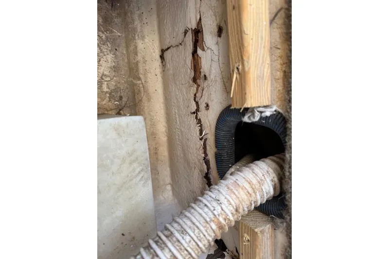 Slide: The Image of Cracked interior wall with exposed wiring in 2014 Sea Ray SLX 350 boat. - 32