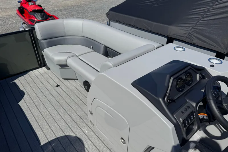 Slide: The Image of 2026 Bentley Pontoons Legacy 223 Navigator interior with sleek seating and modern dashboard. - 8