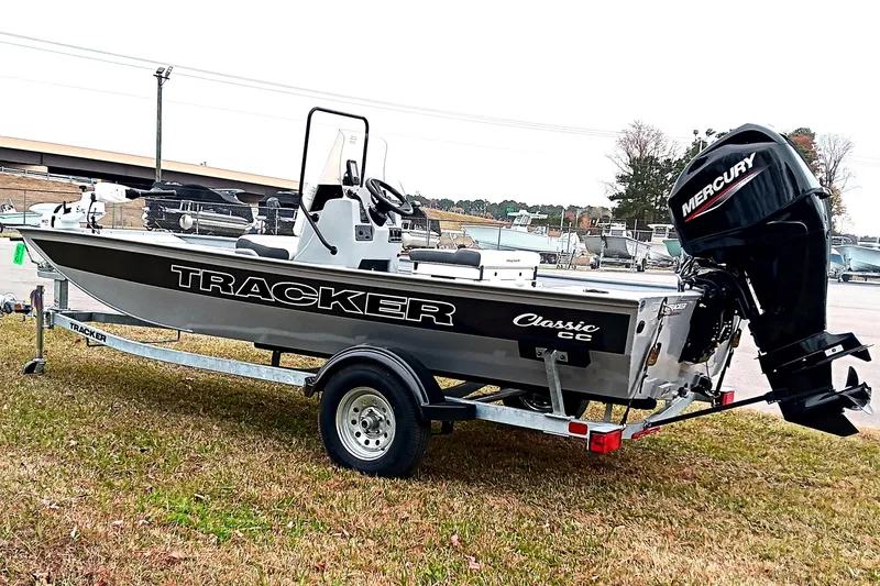 Slide: The Image of 2026 Tracker Bass Tracker Classic CC boat on trailer with Mercury outboard motor. - 4