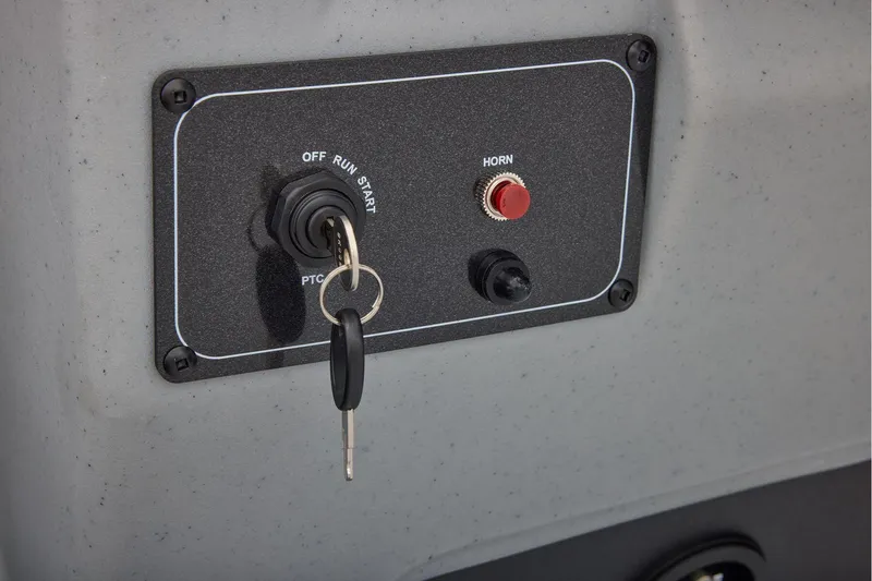 Slide: The Image of Manufacturer Provided Image: 2026 Tracker Bass Tracker Classic CC ignition panel with key and horn button. - 44
