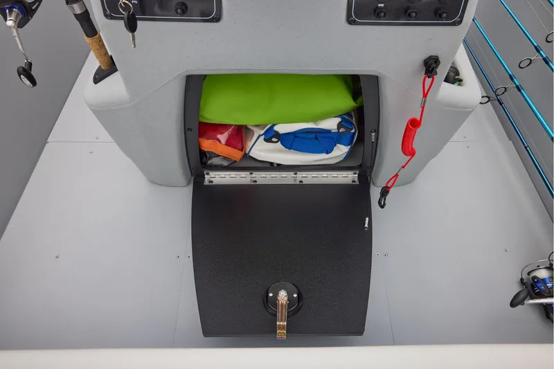 Slide: The Image of Manufacturer Provided Image: 2026 Tracker Bass Tracker Classic CC storage compartment with fishing gear and accessories. - 50