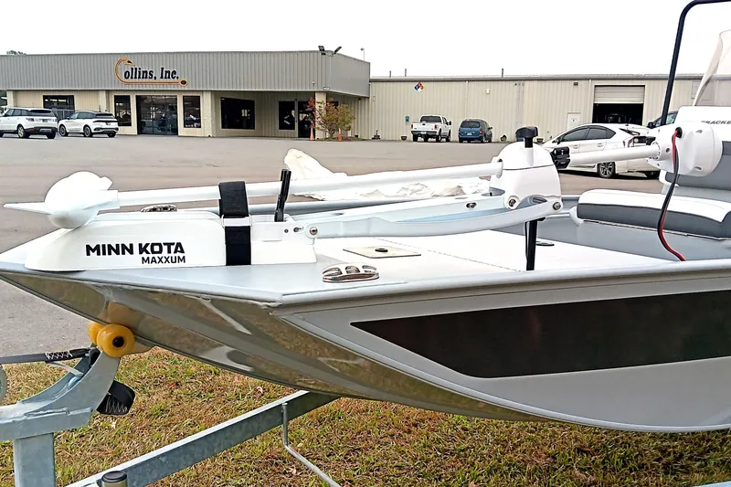 Slide: The Image of 2026 Tracker Bass Tracker Classic CC boat with Minn Kota Maxxum motor at dealership. - 7