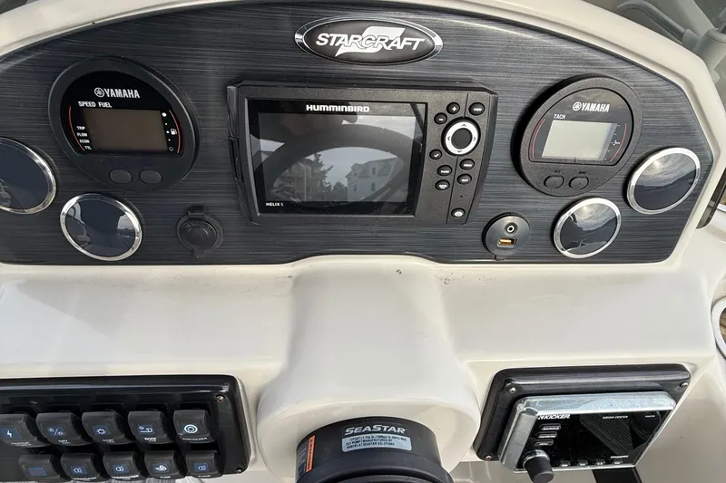 Slide: The Image of Control panel of 2018 Starcraft SLS 5 boat with Yamaha and Humminbird displays. - 12