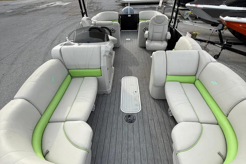 Slide: The Image of 2018 Starcraft SLS 5 pontoon boat with spacious seating and modern design. - 9
