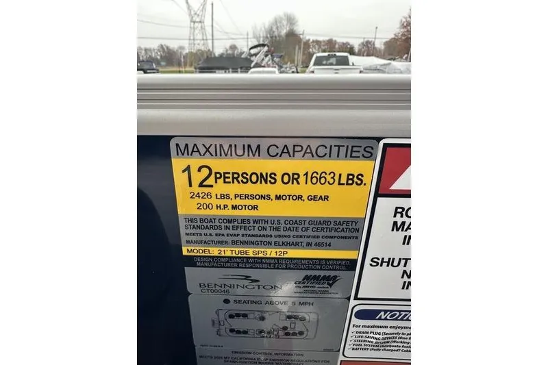 Slide: The Image of 2026 Bennington S Quad Bench 22 SSR capacity label, 12 persons or 1663 lbs, 200 HP motor. - 4