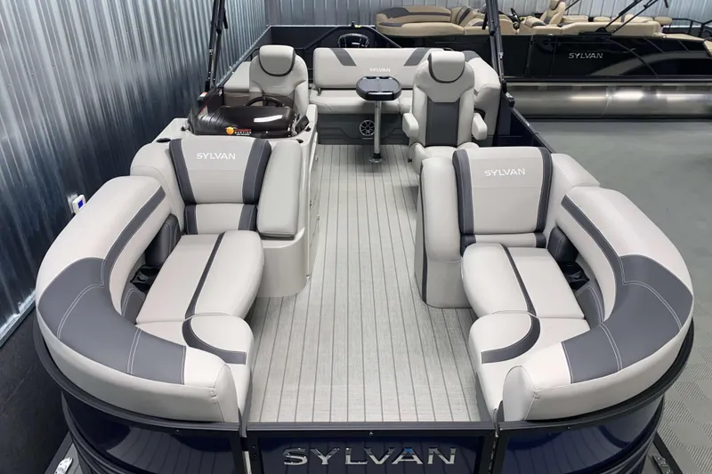 Slide: The Image of 2025 Sylvan L3 CLZ DH pontoon boat with luxurious seating and modern design. - 1