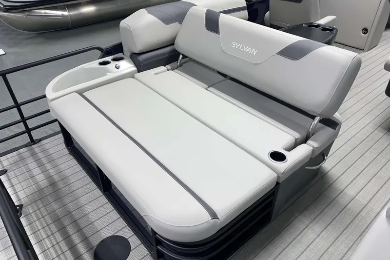Slide: The Image of 2025 Sylvan L3 CLZ DH boat seating with cup holders and sleek design. - 11