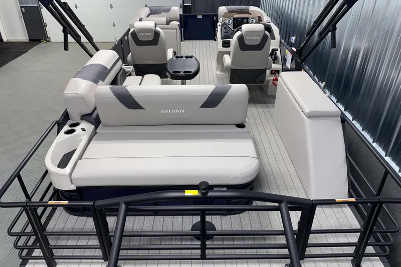 Slide: The Image of 2025 Sylvan L3 CLZ DH pontoon boat interior with modern seating and controls. - 12