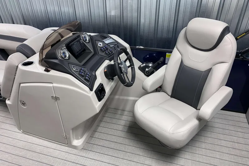 Slide: The Image of 2025 Sylvan L3 CLZ DH boat interior with modern helm and comfortable captain's chair. - 7