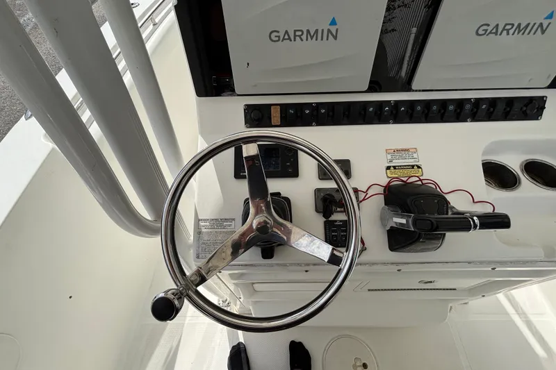 Slide: The Image of Steering console of 2012 Sea Hunt Gamefish 29 with Garmin electronics. - 20