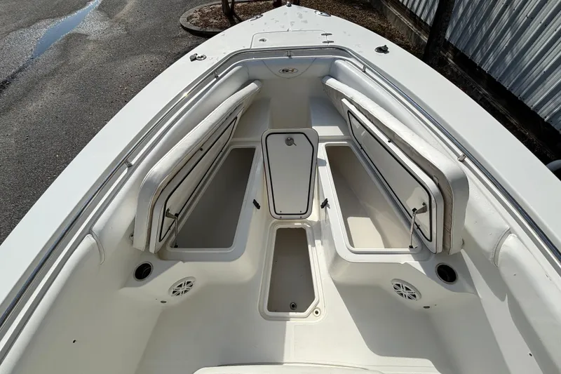 Slide: The Image of 2012 Sea Hunt Gamefish 29 boat interior with open storage compartments. - 25