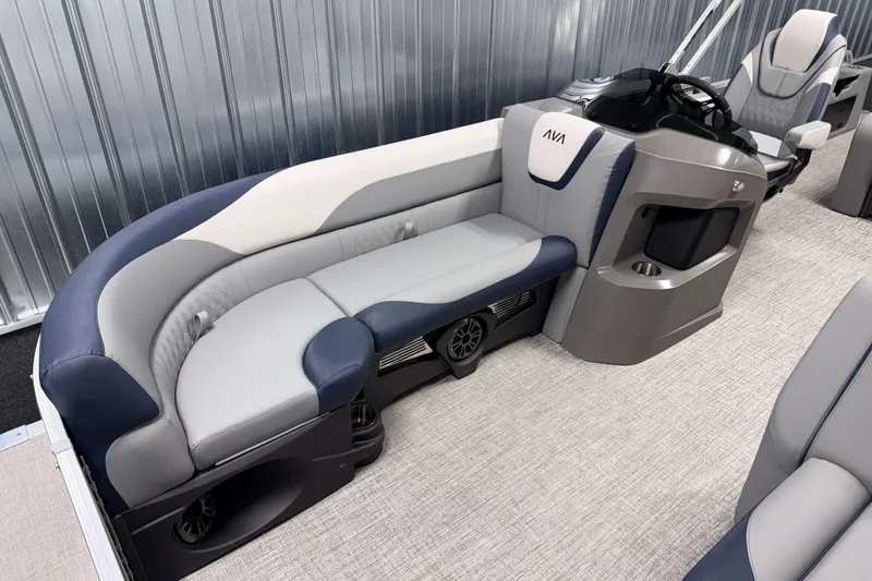 Slide: The Image of 2026 Avalon LSZ 2385 VRB pontoon boat interior with plush seating and modern helm. - 10